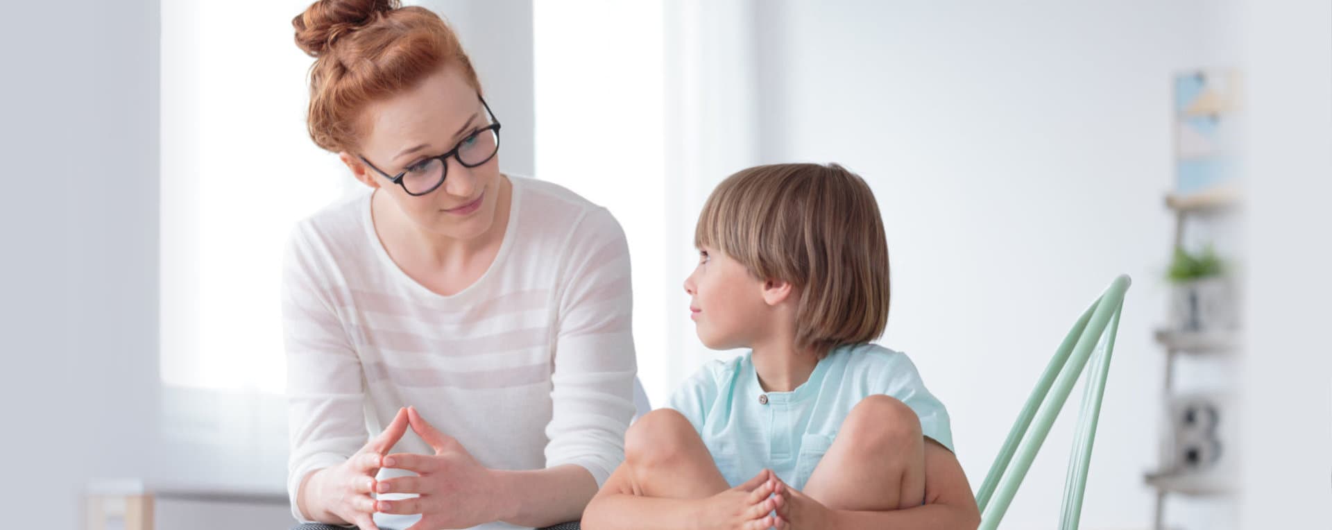 teacher and her student talking