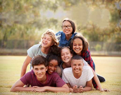 teens lying on top of each other