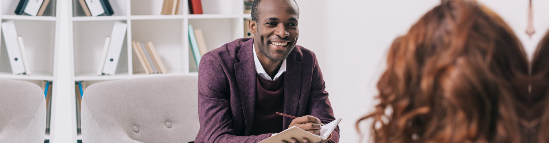 therapist smiling to his client