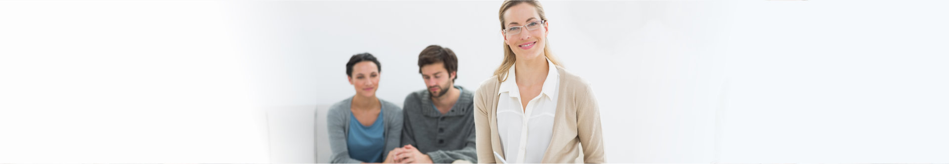 woman counselor with couple at the back